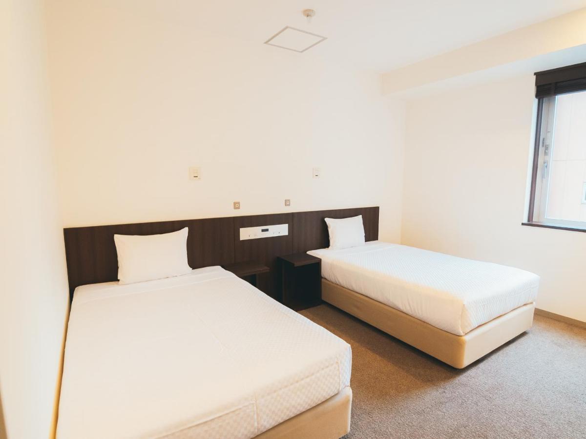 Quintessa Hotel Kokura Comic & Books Kitakyūshū Extérieur photo